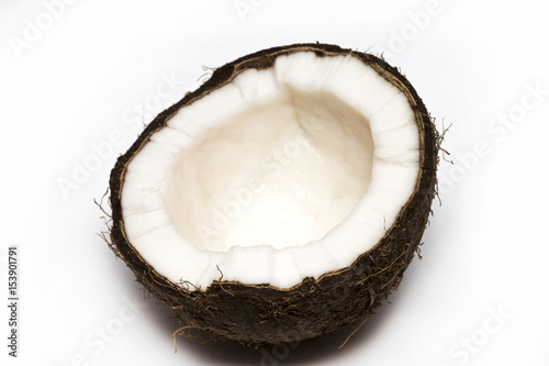 Half coconut top view isolated on white
