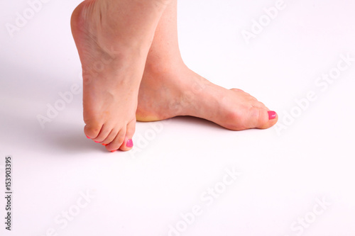 Closeup photo of a beautiful female feet with pedicure © lenetsnikolai
