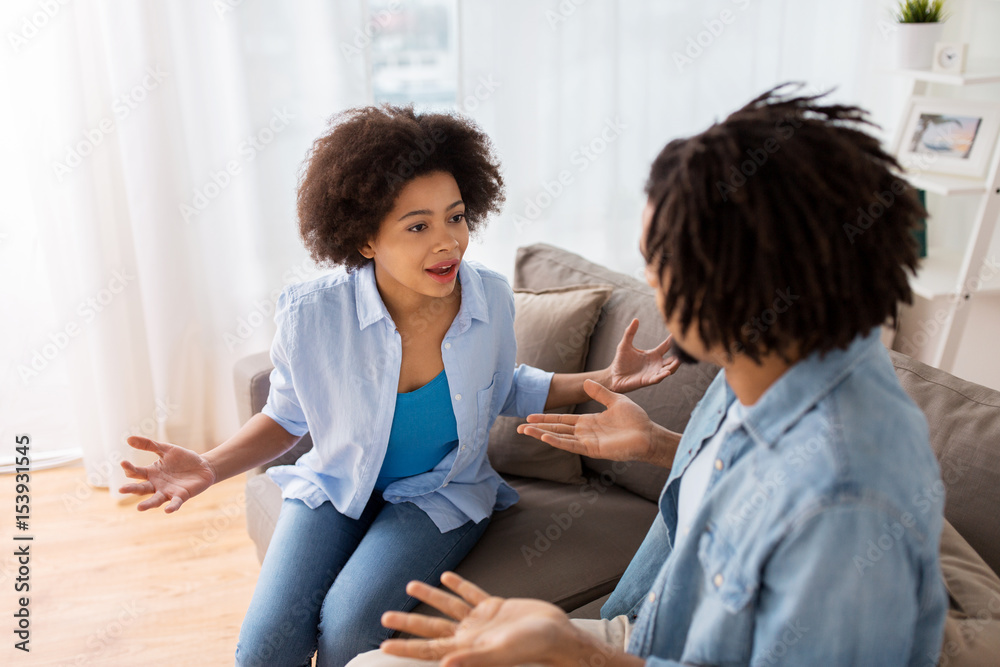 unhappy couple having argument at home unhappy couple having argument at home