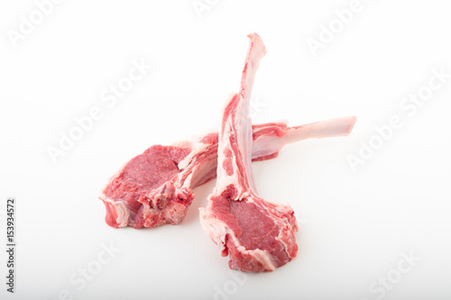 isolated raw lamb meat photo