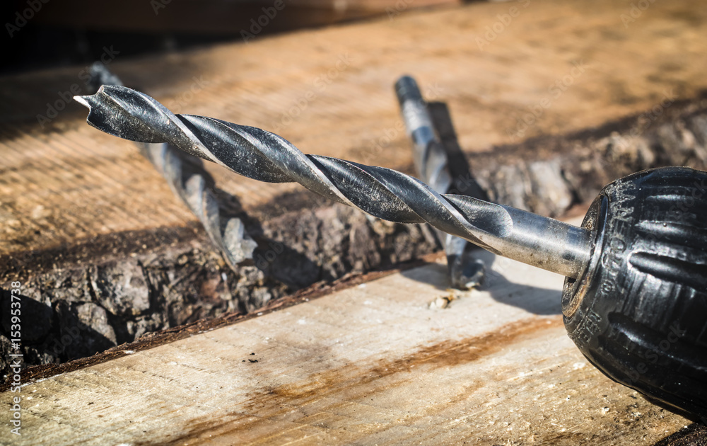Obraz premium Drills on the background of wood