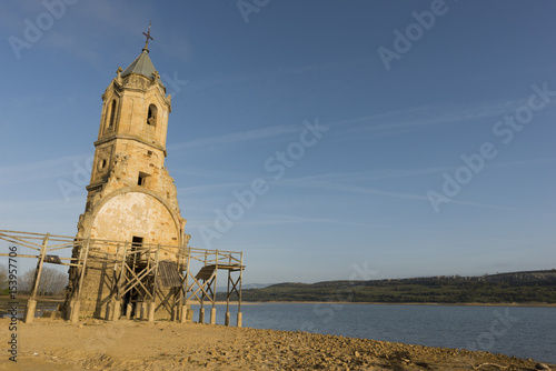 The abandoned tower of the ebro reservoir in Cantabria photo