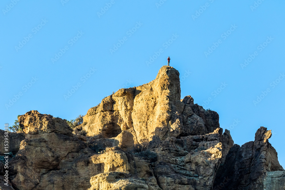 Person on the top of the rock at Smith Rock State Park