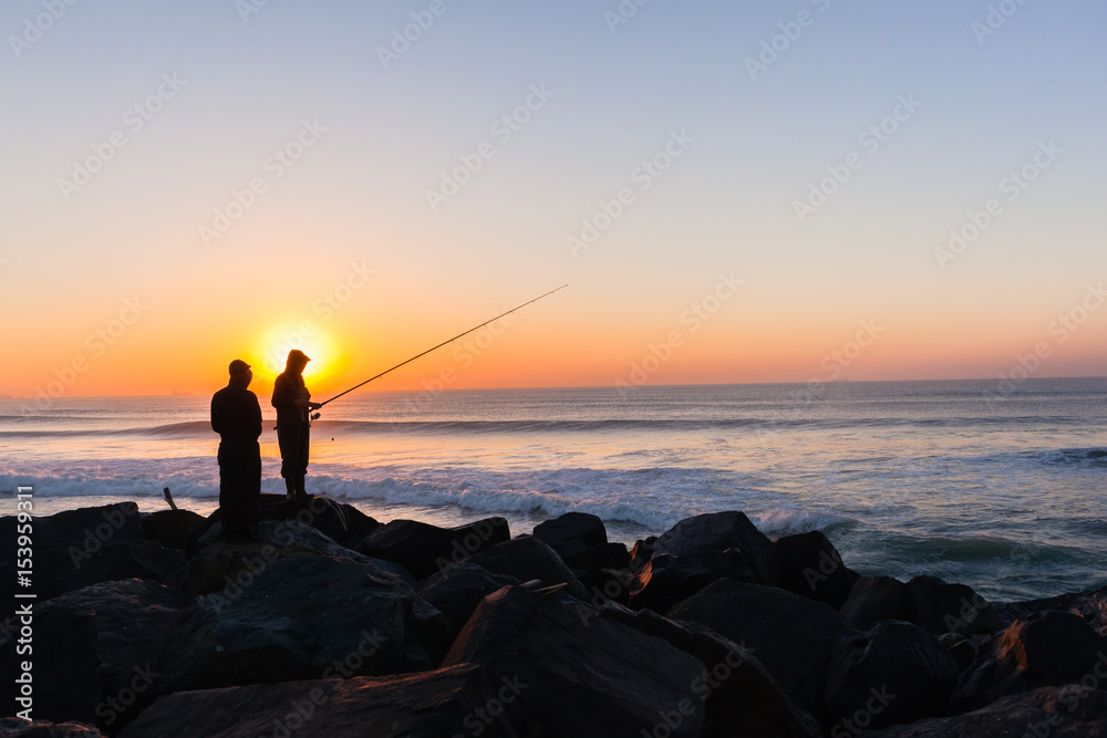 Fishermen Silhouetted Ocean Beach Horizon Sunrise
