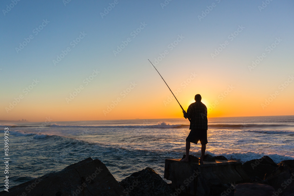Fisherman Silhouetted Ocean Horizon Sunrise Beach 