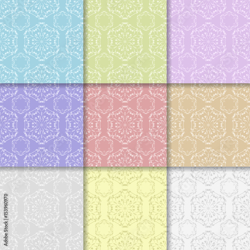 Floral seamless patterns. Colored background