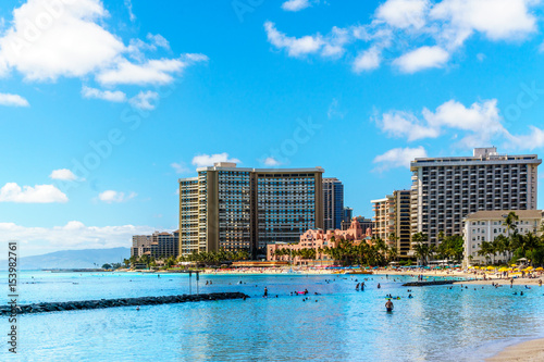 Waikiki Beach, with its many resorts under blue sky and white sand, makes it one of the world's most famous beaches. Located in Honolulu on the Hawaiian island of Oahu 