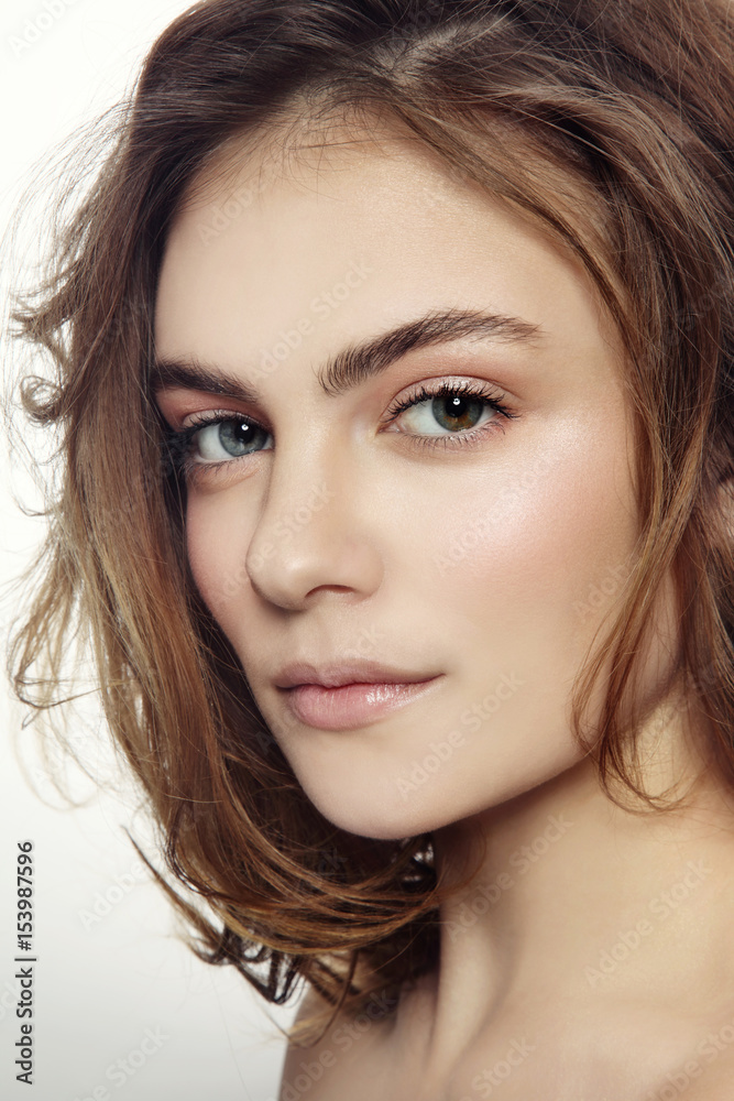 Portrait of young beautiful sexy girl with clean make-up and messy hairdo Portrait of young beautiful sexy girl with clean make-up and messy hairdo