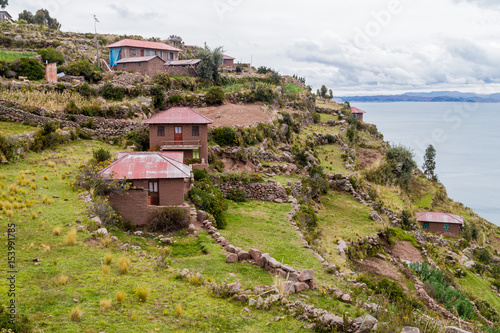 Village on Taquile island in Titicaca lake, Peru photo