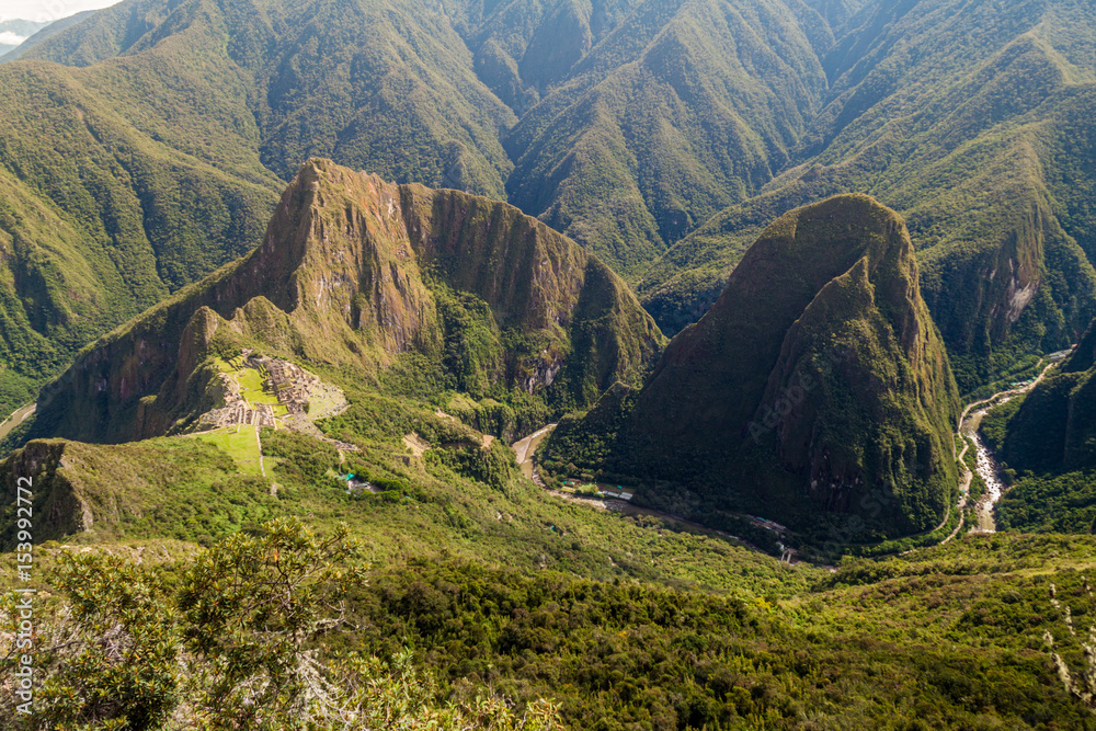 Obraz premium Aerial view of Machu Picchu ruins and Urubamba valley from Machu Picchu mountain, Peru