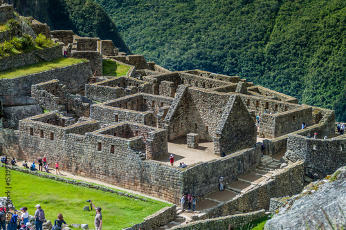 MACHU PICCHU, PERU - MAY 18, 2015: Crowds of visitors at Machu Picchu ruins, Peru.