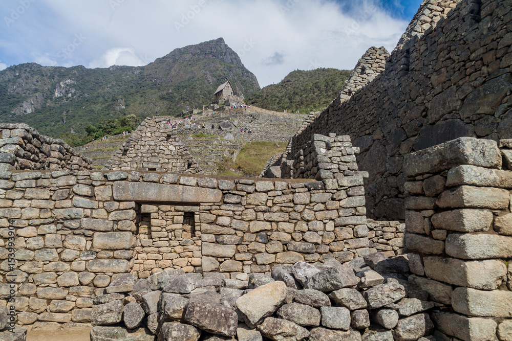 Preserved buildings at Machu Picchu ruins, Peru