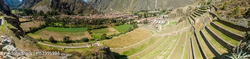 Panorama of Inca agricultural terraces and village Ollantaytambo, Sacred Valley of Incas, Peru