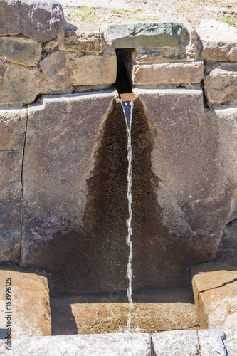 Ceremonial Bath at Inca ruins in Ollantaytambo, Sacred Valley of Incas, Peru photo