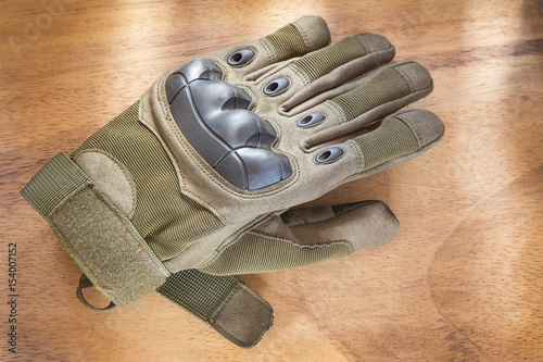 Gloves on the wooden background