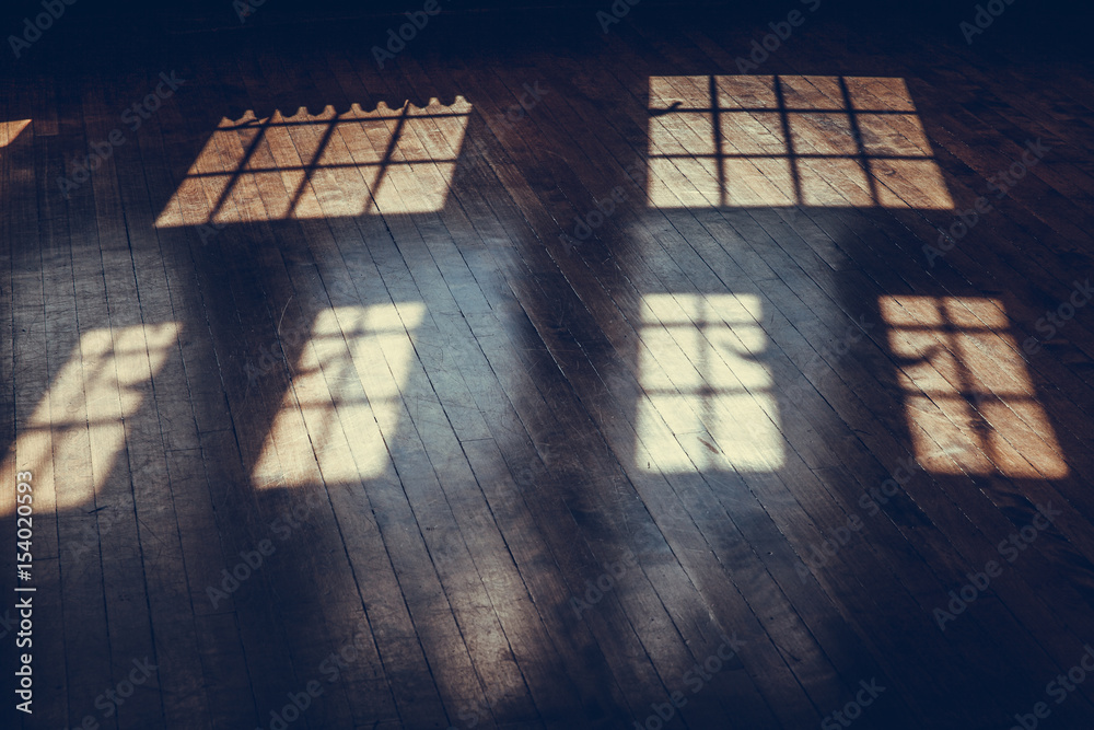 light from windows on an old wood floor in the castle rooms light from windows on an old wood floor in the castle rooms