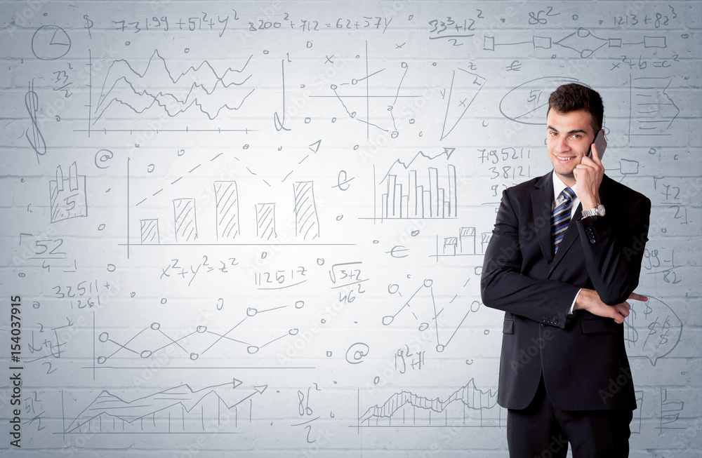 Salesman standing with drawn graph charts Salesman standing with drawn graph charts