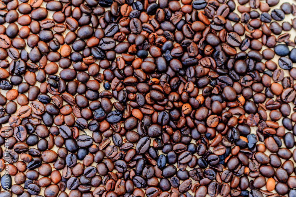 Brown roasted coffee beans (selective focus) Brown roasted coffee beans (selective focus)