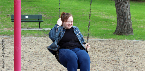 Young Woman with Down syndrome at the park