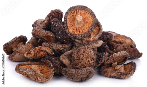 dried shiitake mushrooms isolated on a white background