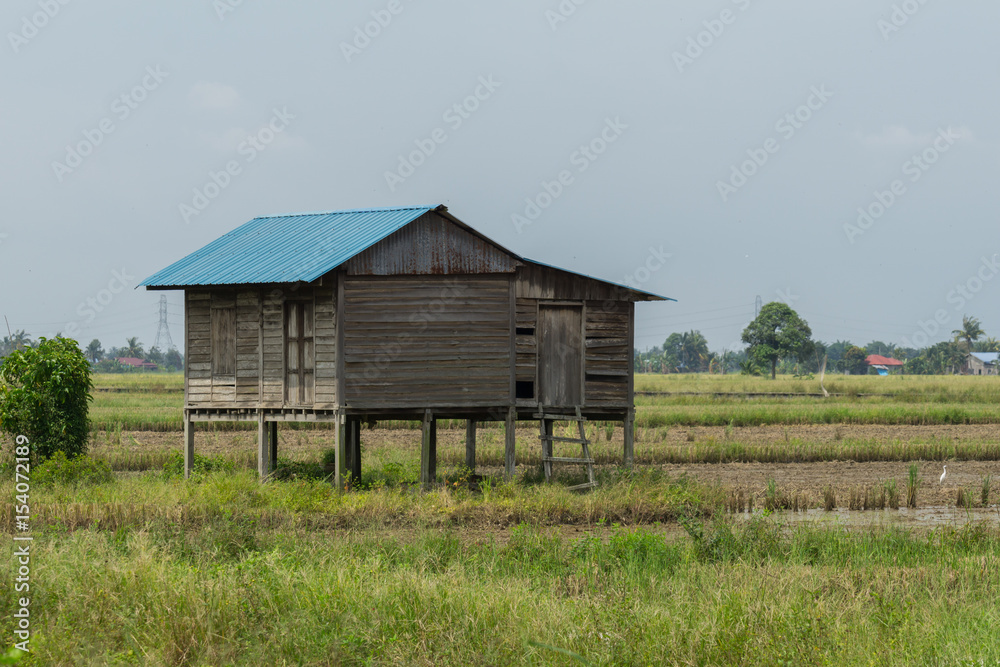 Abandoned house at paddy fields in Sabak Bernam, Malaysia Abandoned house at paddy fields in Sabak Bernam, Malaysia