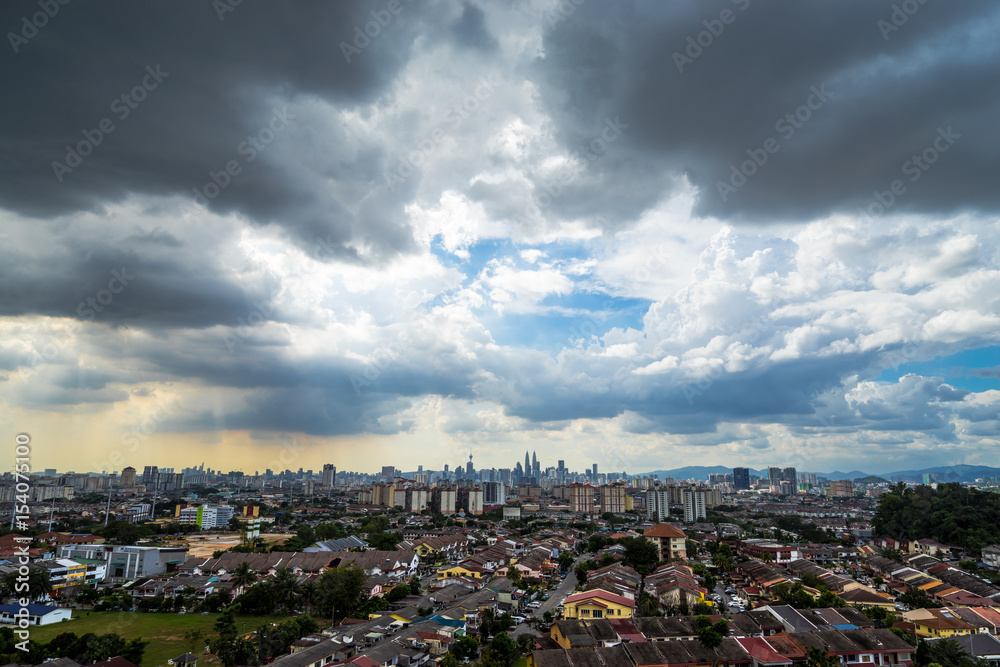 Downtown Kuala Lumpur during cloudy and sunny day