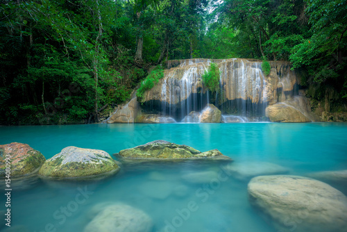 Fototapeta Naklejka Na Ścianę i Meble -  Waterfall in forest at Erawan waterfall National Park, Kanchanaburi, Thailand
