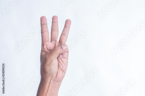 Hand with two fingers separated from white background.