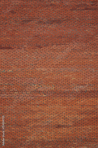Red brick stone wall vertical background