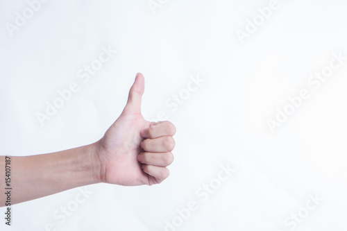 man hand with thumb up isolated on white background
