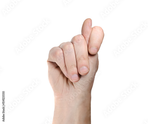 Hand showing a fig sign isolated on white background photo