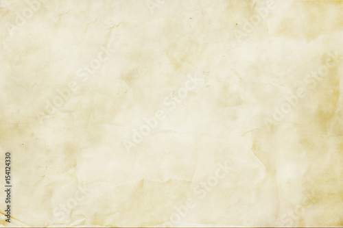 Crumpled paper texture in beige. Paper background texture