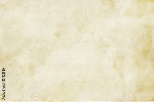 Crumpled paper texture in beige. Paper background texture