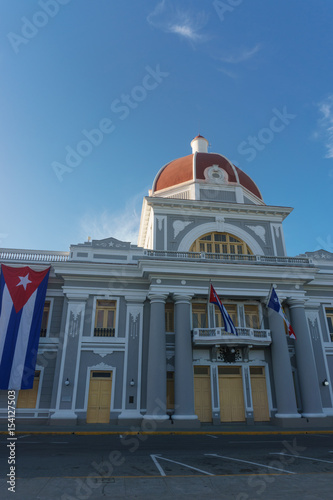 cienfuegos, cuba. City Hall with cuban and part Flags on facade during celebration of 1 january.