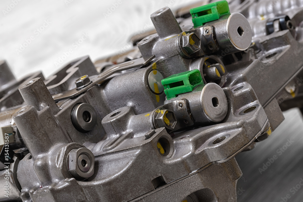 Fototapeta premium Mechanical part with metal components and hydraulic valves