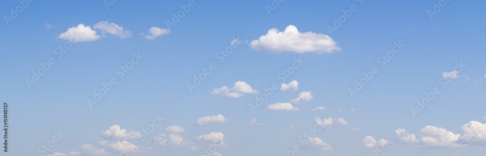 White clouds flying in deep blue summer sky White clouds flying in deep blue summer sky