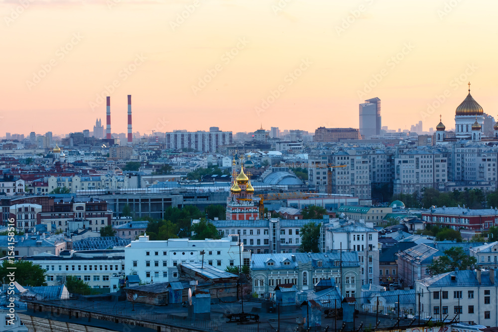 The Golden dome of the Orthodox Church among the houses. The view from the top.
