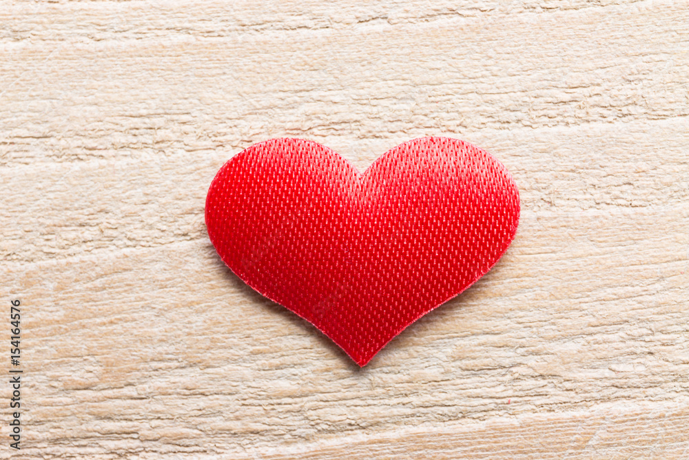 Heart-shaped objects on a wooden background Heart-shaped objects on a wooden background