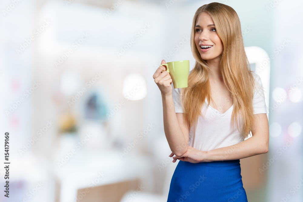 cup in woman's hands