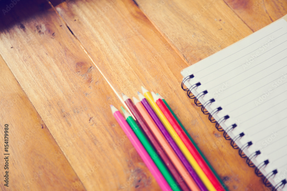 Obraz premium Student's desk with blank holiday phone