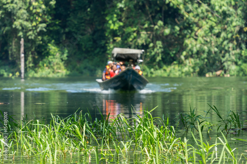 PERAK, MALAYSIA - 19TH MARCH 2017; Local tourist enjoying a boat ride in Royal Belum Rainforest Park, is believed to have been in existence for over 130 million years