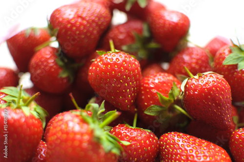 Heap of fresh organic strawberries isolated
