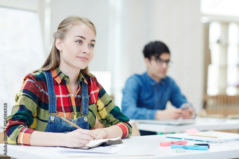Student of university attending lecture Student of university attending lecture