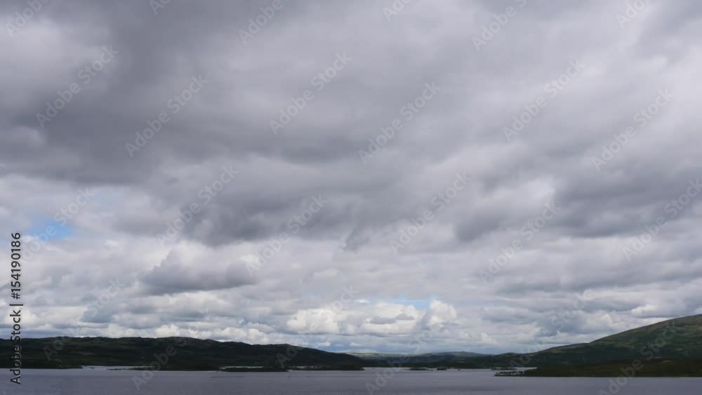 Time lapse of clouds moving across a lake in Norway Time lapse of clouds moving across a lake in Norway