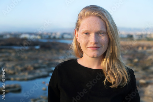  portrait of a beautiful young woman on the sea coast © Kateryna
