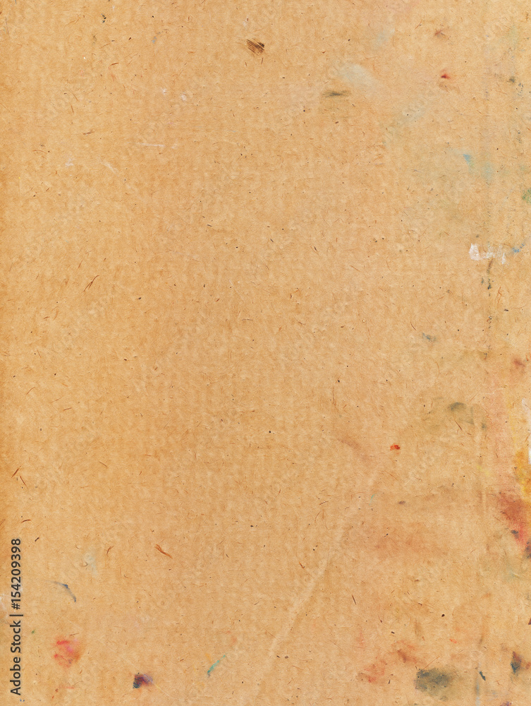 cardboard empty space for the text background brown yellow covered with spots of oil paint textured and dark reflections cardboard empty space for the text background brown yellow covered with spots of oil paint textured and dark reflections