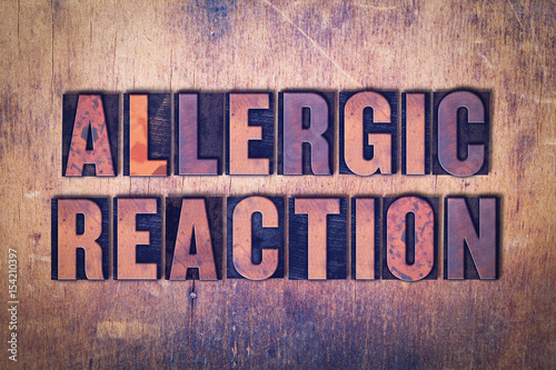 Allergic Reaction Theme Letterpress Word on Wood Background