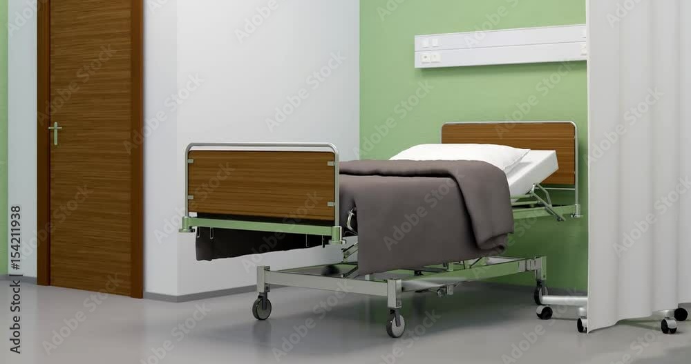 Hospital bed in ward with closed door against a background of green walls Hospital bed in ward with closed door against a background of green walls