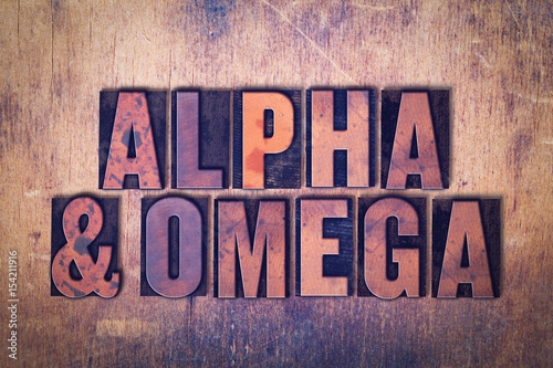 Alpha and Omega Theme Letterpress Word on Wood Background
