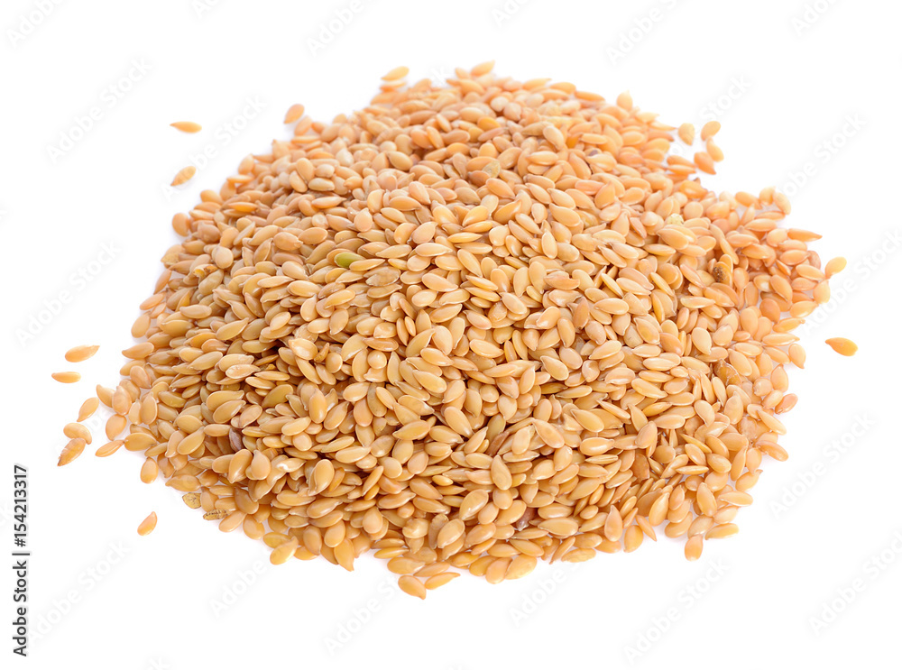 Golden flax seeds close up isolated on a white background Golden flax seeds close up isolated on a white background